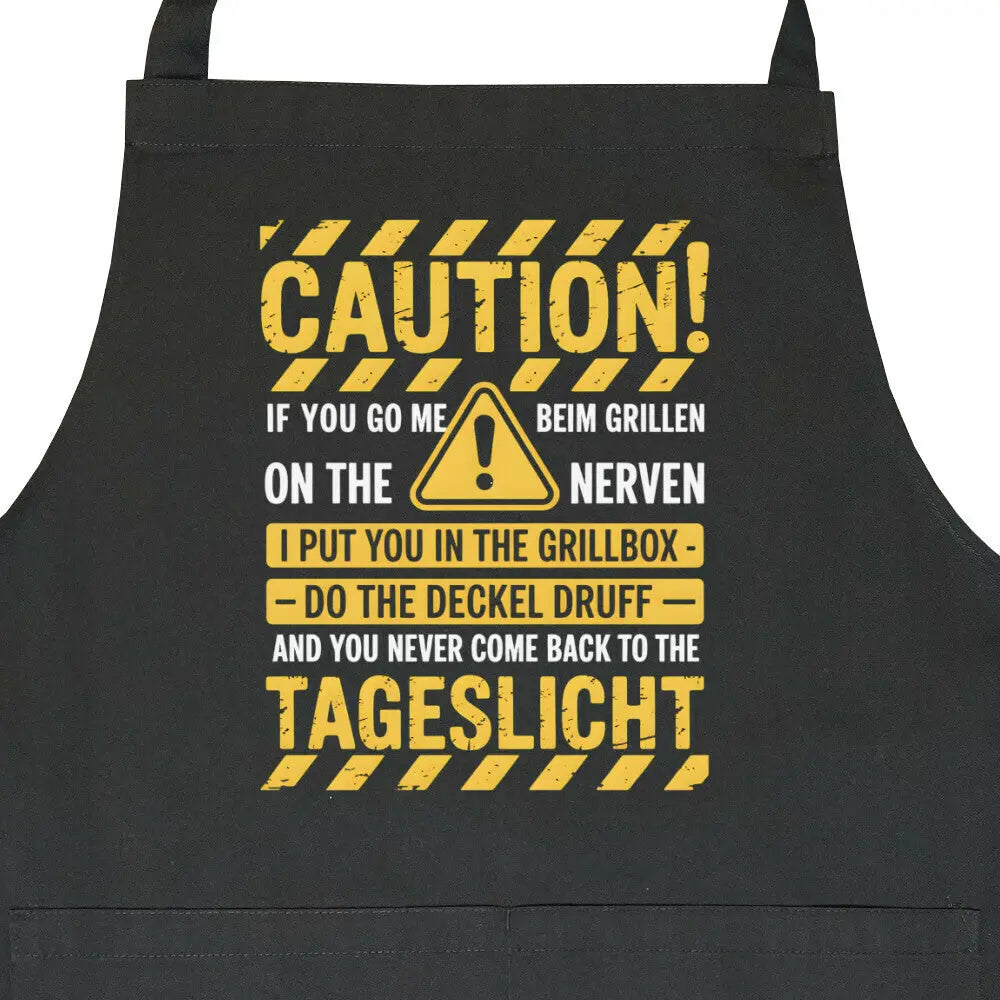 Caution! – Warnschild-Grillschürze – Motivdruck in Schwarz, Nahaufnahme