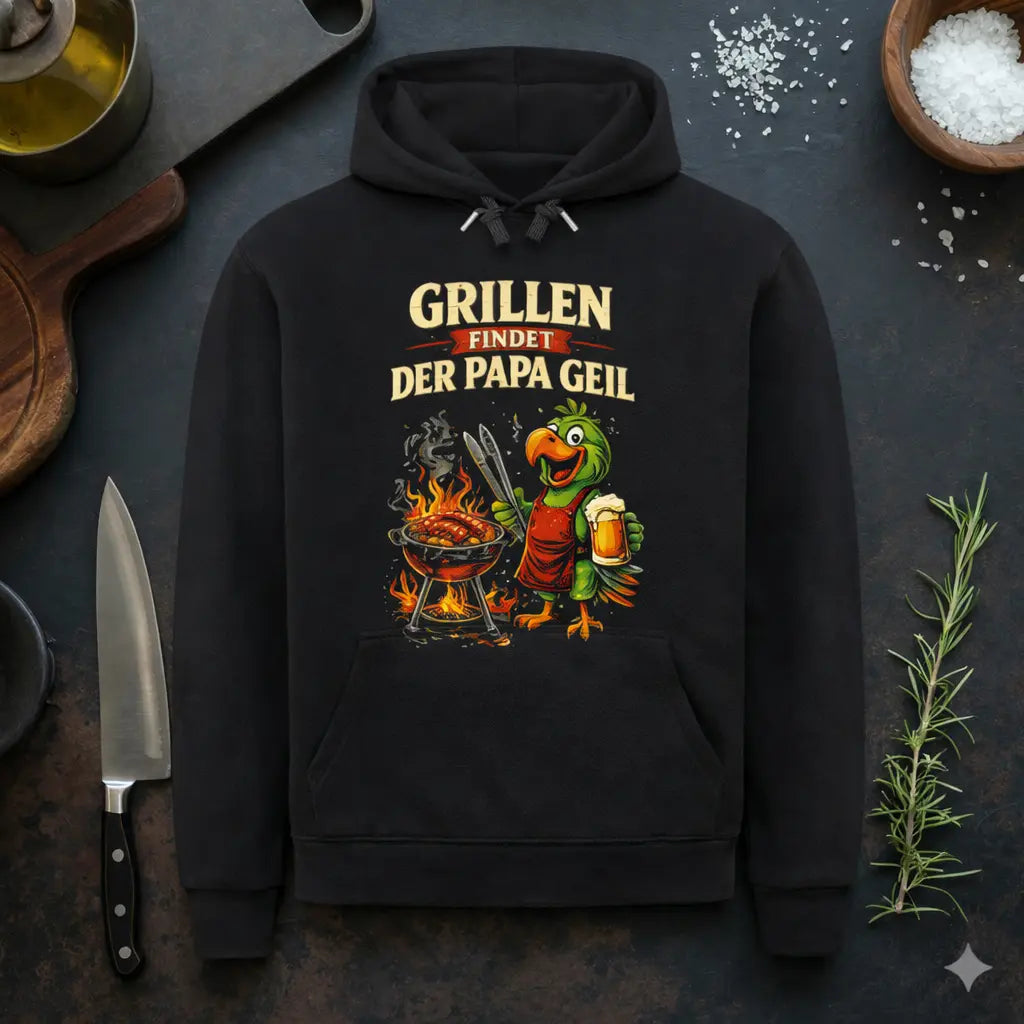 Schwarzer Meatware Hoodie mit lustigem BBQ Papagei Design „Grillen findet der Papa geil“, Grillmotiv mit Bier und Würstchen im rustikalen Küchen Mockup – Shirts & more mit Geschmack