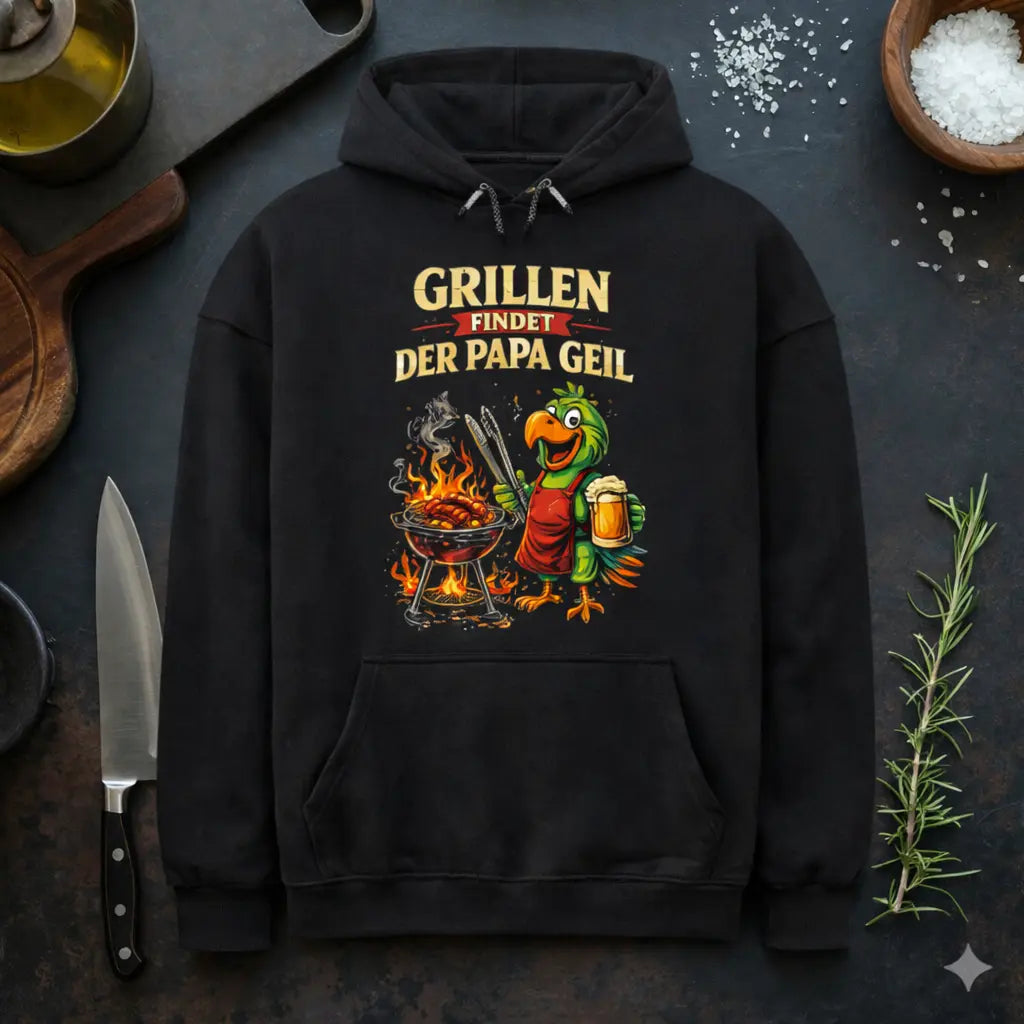 Schwarzer Meatware Oversized Hoodie mit lustigem BBQ Papagei Design „Grillen findet der Papa geil“, Grillmotiv mit Bier und Würstchen im rustikalen Küchen Mockup – Shirts & more mit Geschmack